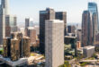 Commercial real estate investors conducting thorough market research with data charts