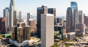 Commercial real estate investors conducting thorough market research with data charts
