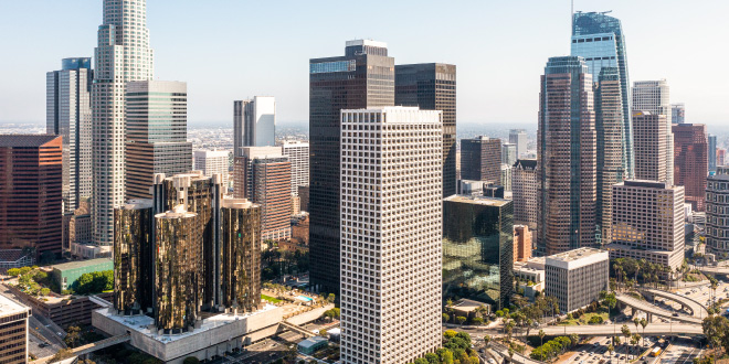 Commercial real estate investors conducting thorough market research with data charts