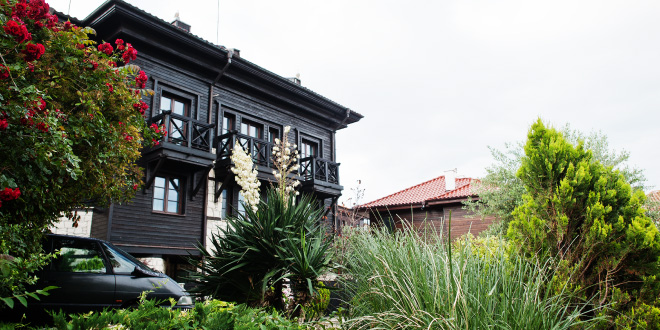A welcoming suburban house, representing an ideal home or perfect living space