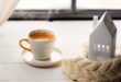 A close-up, inviting image of a perfectly brewed cup of coffee, perhaps with latte art, representing the search for coffee near me